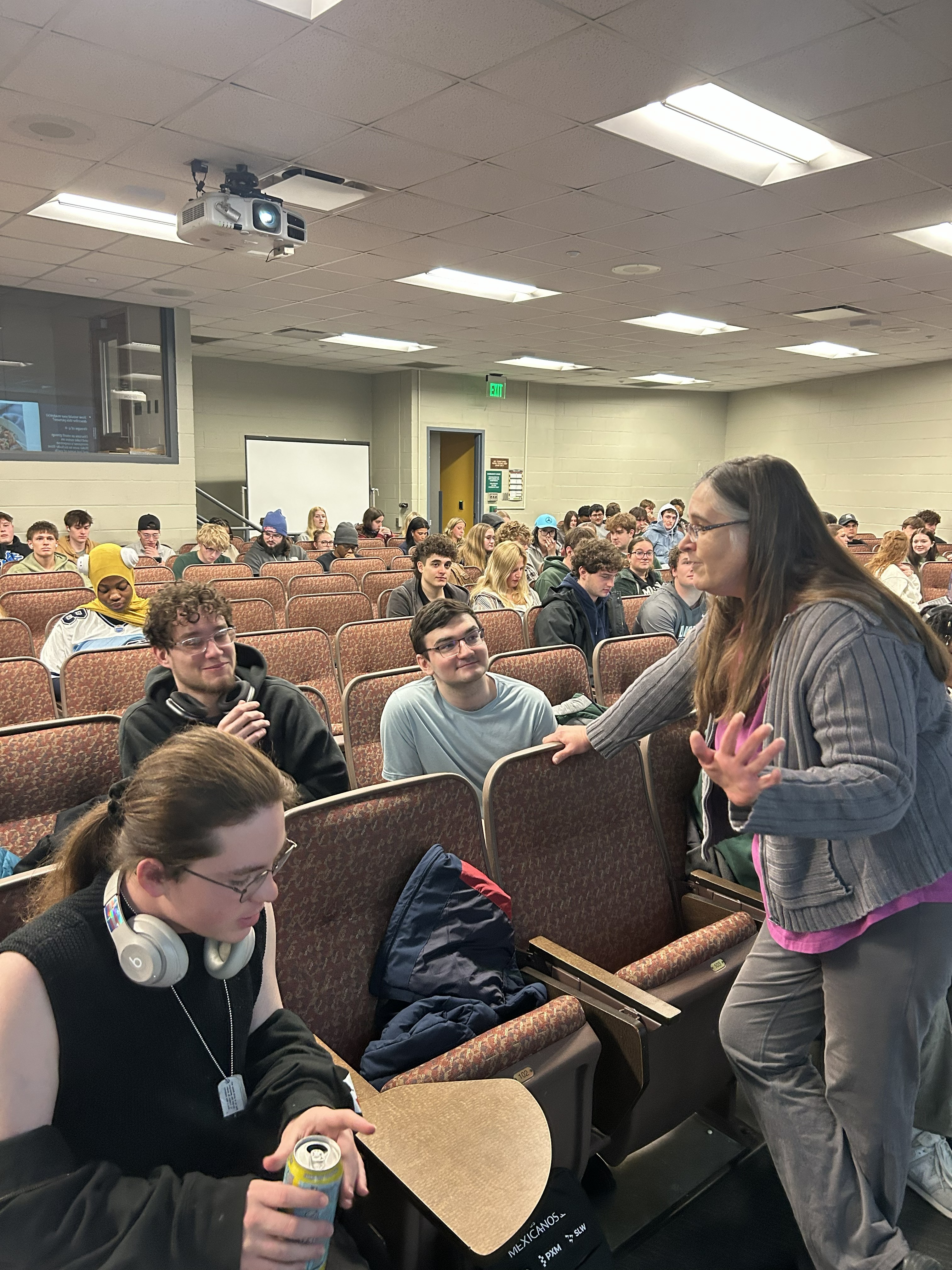 Photo of Marcie Cowley teaching students in her classroom.