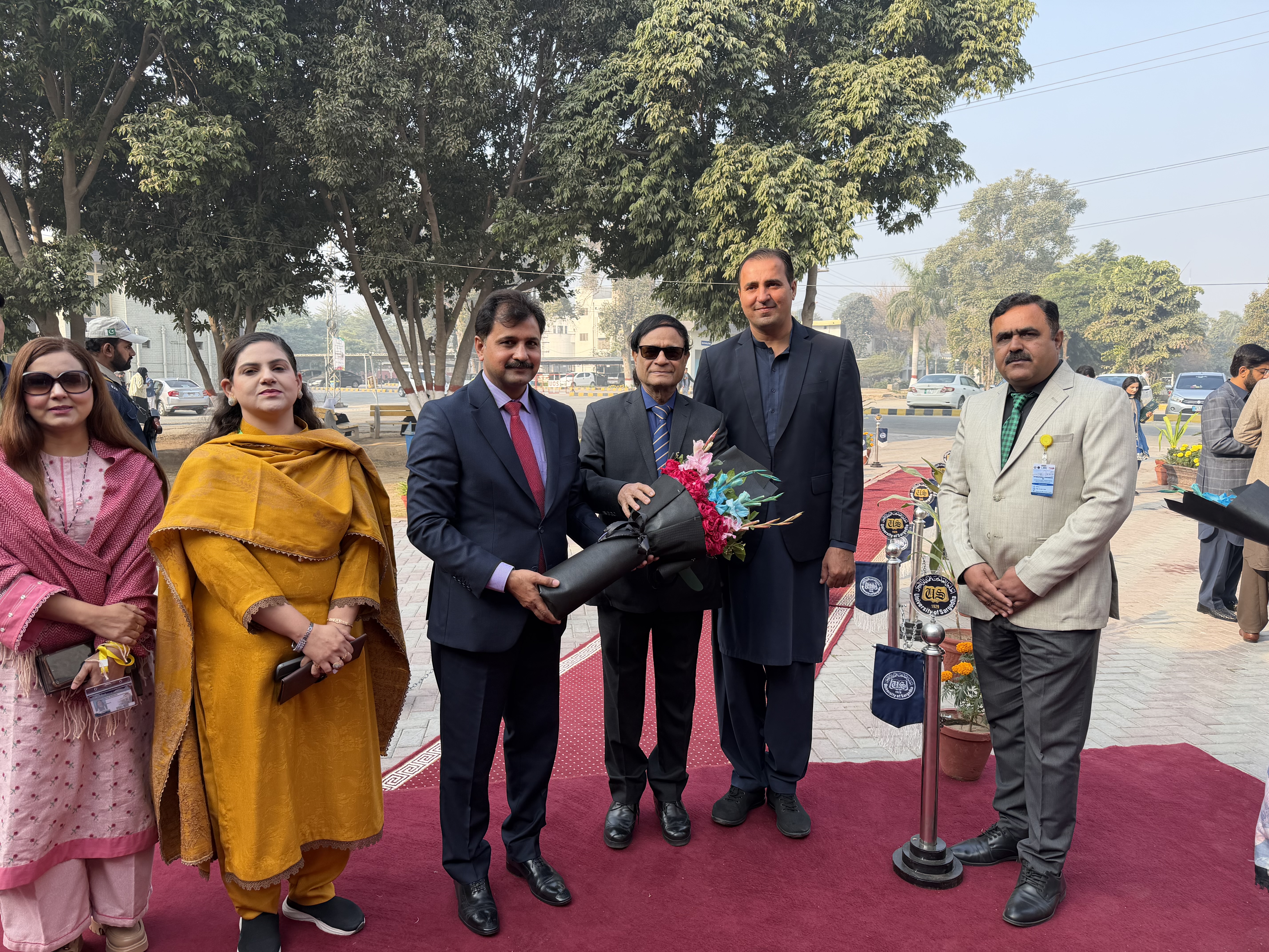 Dr. Hussain with other presenters in Pakistan.